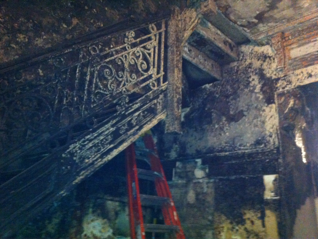 <p>The building's lobby remained charred almost two weeks after the fire on Dec. 9, 2012.</p>
