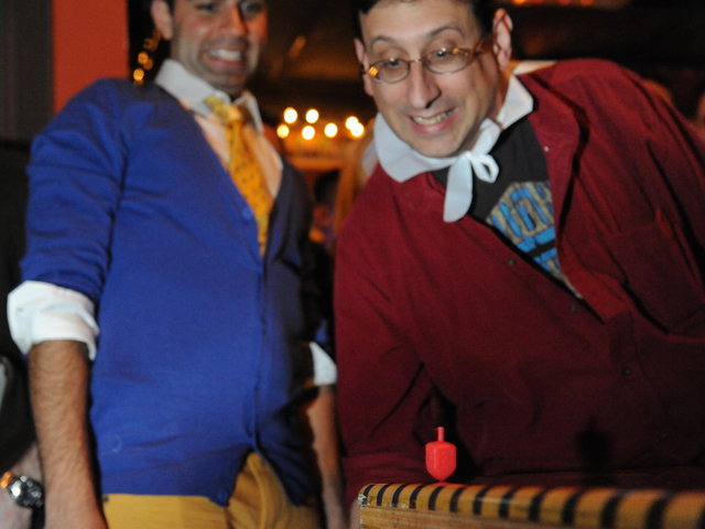 <p>Rob Frank (left) and David Goldberg compete against each other.</p>
