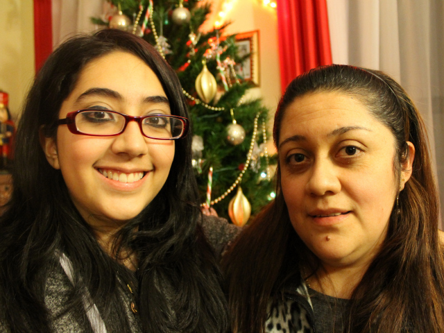 <p>Marcela Pinos with her mother Mariela Torres in their apartment on the Grand Concourse in The Bronx. Torres is trying to help her daughter raise money.</p>
