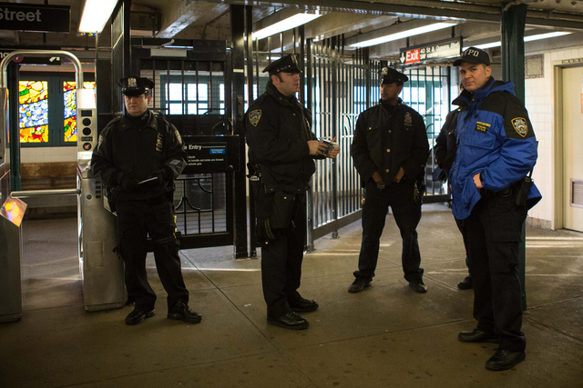 <p>A heavy police presence remained at 40th Street station in Sunnyside Friday morning, Dec. 28, 2012, hours after a woman pushed a man in front of an oncoming 7 train the night before.</p>
