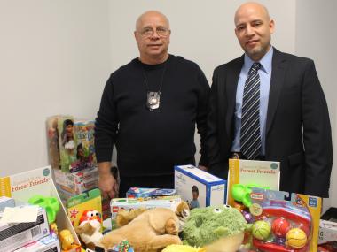 Court officers at the Red Hook Community Justice Center delivered hundreds of donated toys to more than 120 needy children Wednesday, Dec. 19, 2012.