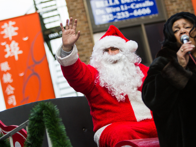 <p>Santa Claus makes an appearance at the East Meets West Parade that took place in Chinatown & Little Italy on Dec. 22nd, 2012.</p>
