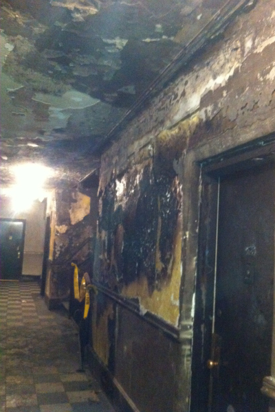 <p>The building's second-floor hallway after the fire.</p>
