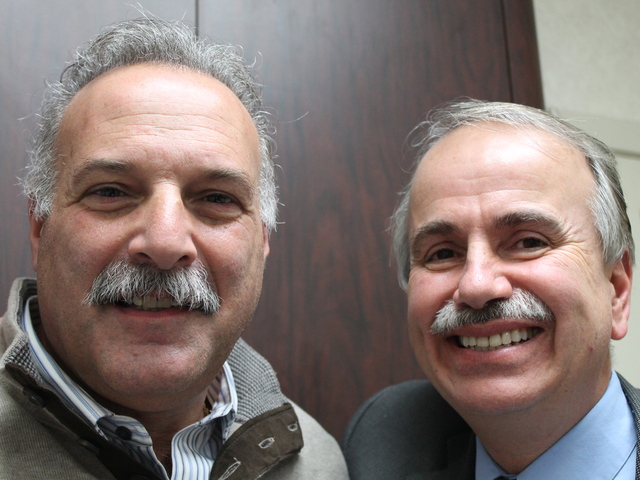 <p>Astoria business owners Paul Halvatzis (right) and Gary Bonelli (left) have offered to shave their mustaches to raise money for a local autism services organization.</p>
