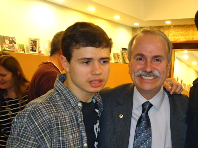 <p>Paul Halvatzis with his son, Paulie Halvatzis, at their fundraiser party last year.</p>
