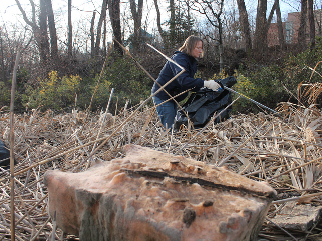 <p>Hundreds of pounds of trash line the Sherman Creek shorline in the aftermath of Hurricane Sandy.</p>
