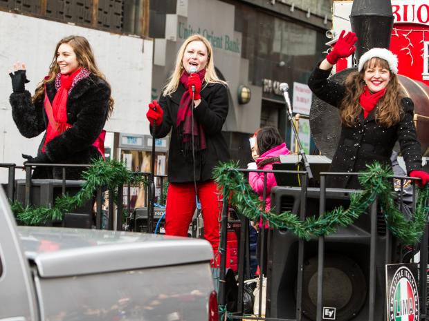 <p>(L-R) Gina Marie Blase, Miss Little Italy with singers Heather O'Connor and Jenna Esposito at the East Meets West Parade in Chinatown & Little Italy on Dec. 22nd, 2012.</p>