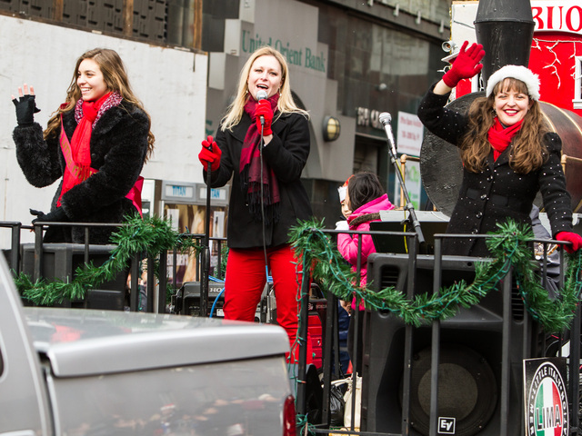<p>(L-R) Gina Marie Blase, Miss Little Italy with singers Heather O'Connor and Jenna Esposito at the East Meets West Parade in Chinatown & Little Italy on Dec. 22nd, 2012.</p>

