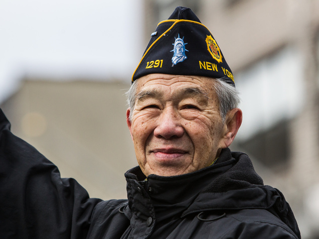 <p>A war veteran takes in the sights and sounds of the annual East Meets West Parade in Chinatown & Little Italy on Dec. 22nd, 2012.</p>
