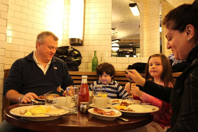 <p>The Susel family eats breakfast on the Smith's first day serving breakfast.&nbsp;</p>
