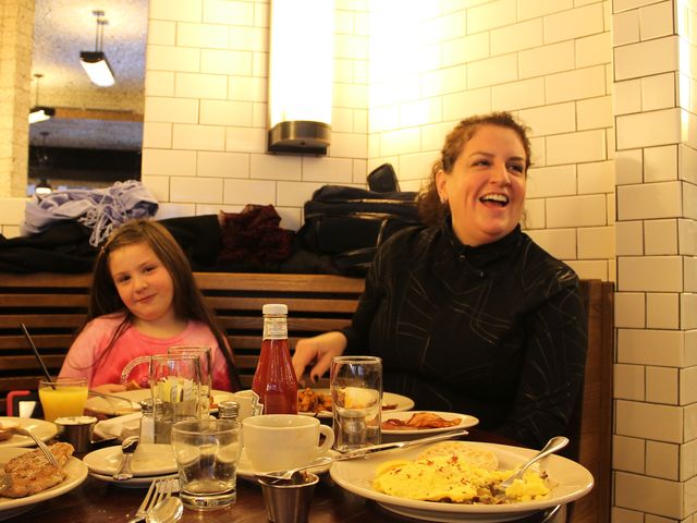 <p>Monica Susel and her daughter Sasha enjoy breakfast at The Smith.&nbsp;</p>
