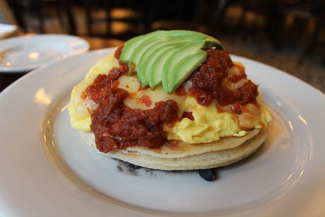 <p>The Ranchero Scramble: chipotle salsa, black beans, tortillas, cheddar and avocado.</p>
