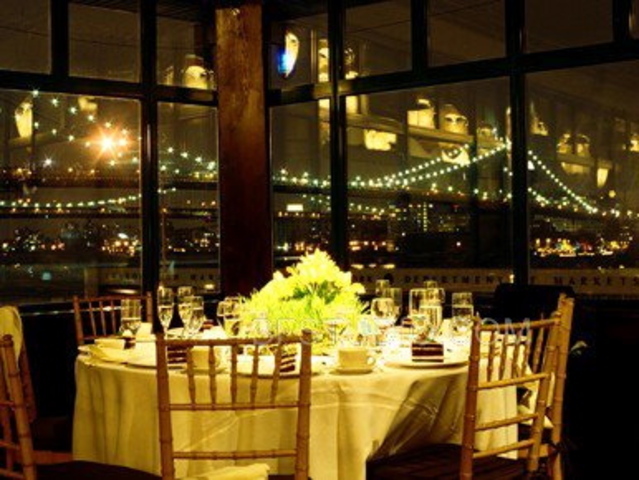 <p>The interior of&nbsp; popular Seaport catering hall Bridgewaters, before being shuttered during Hurricane Sandy. Brides say they loved the views of the Brooklyn Bridge.</p>
