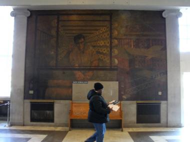 The USPS says it no longer needs the massive building, but locals fret over the landmark's fate.