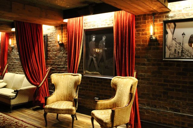 <p>Vintage furniture decorates the downstairs lounge.</p>
