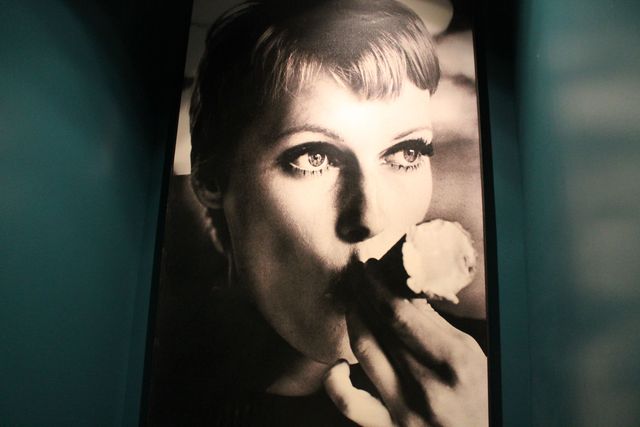<p>Black and white photos line the walls.&nbsp;</p>
