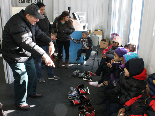 <p>Cary Goodman, head of the 161st Street BID, plays with students from the Highbridge Advisory Council&rsquo;s Head Start program, which is located across the street from Yankee Stadium.</p>
