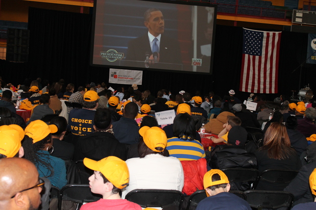 <p>Almost 2,000 people gathered at the Harlem Armory to watch President Barack Obama's second inauguration and perform acts of service.</p>
