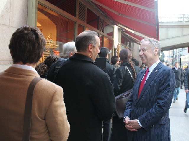 <p>Mayoral candidate George McDonald greeted people waiting in line to attend a job fair after his announcement.</p>
