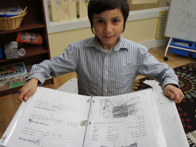 <p>Uriyah Sidof, 7, at Lamplighters Yeshivah in Crown Heights. Unlike many of the 84,000 other Jewish parochial students in Brooklyn, students at Lamplighters learn religious and secular subjects side by side.</p>
