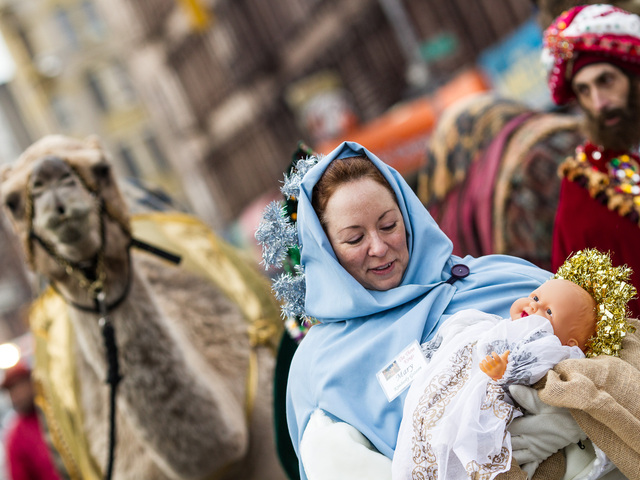 <p>A woman dressed as Mary, the mother of baby Jesus, at the 36th Annual Three Kings Day Parade in East Harlem on Jan. 4, 2013.</p>
