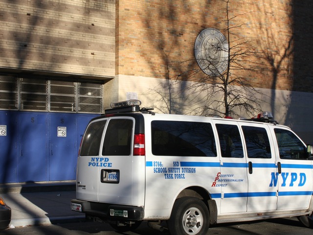 <p>An NYPD van sits outside the South Bronx Preparatory school, where several laptops were discovered missing, on Jan. 7, 2013.</p>

