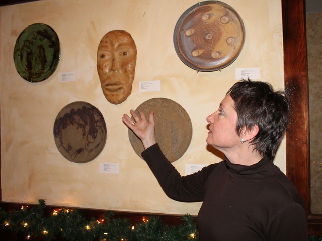 <p>Flo Kaczorowski pointed at her piece 