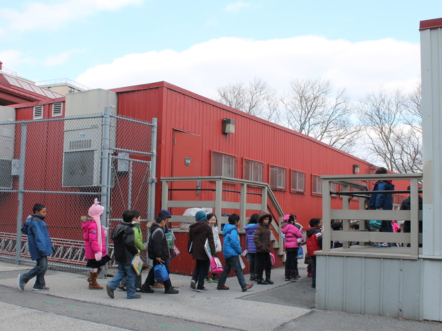 <p>P.S. 11 in Woodside is a popular neighborhood school but has long suffered from severe overcrowding. Officials recently announced that the school will be getting a new annex built to replace trailer classrooms, which have been used to house students for the last 12 years.</p>
