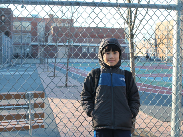 <p>Kalden Choden, 9, outside P.S. 199 in Sunnyside, Queens, where he attends fourth grade. Mom Kunzang Choden says she likes the school for its friendly staff and hardworking principal, Anthony Inzerillo.</p>
