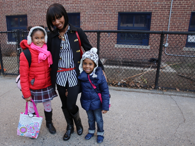 <p>Nyla Oliver, 4, poses with her mom Yvette Zimmerman and her cousin Demi Irving, 8, outside of P.S. 20 in Fort Greene.</p>
