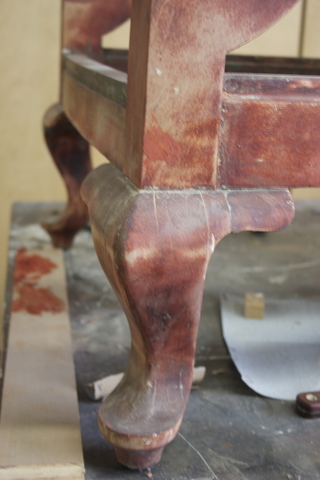 <p>You won't be able to get every nook and cranny cleaned. The wood may also have different hues throughout based on how much of the original stain you can get out. Christopher Anigacz, founder of Double Queue Fine Furniture Restoration and Conservation in Long Island City uses a chisel to chip out the corners of paint but amateurs should be careful not to damage the wood.</p>
