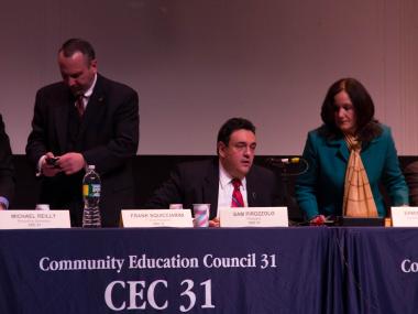 The committee voted to hire armed ex-cops in schools, but the city said it was unlikely to happen.