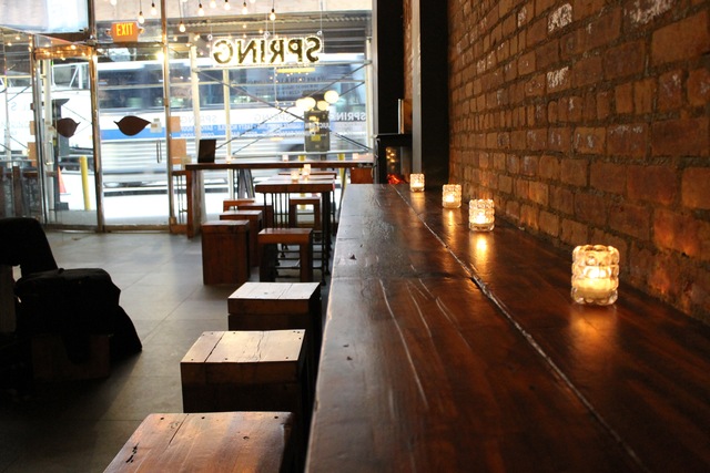 <p>Spring has exposed brick walls, wooden benches, and large windows, which Yuan says are being blocked by scaffolding.</p>
