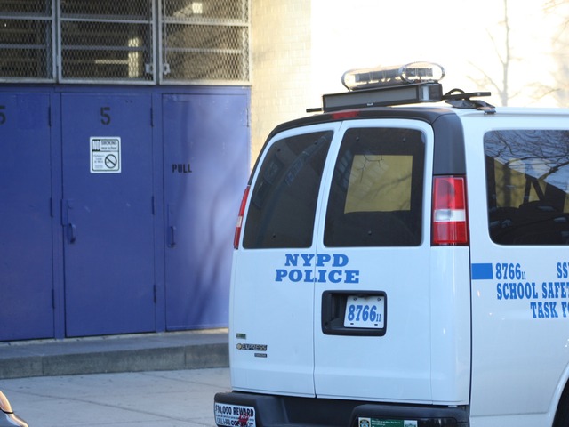 <p>An NYPD van sits outside the South Bronx Preparatory school, where several laptops were discovered missing, on Jan. 7, 2013.</p>
