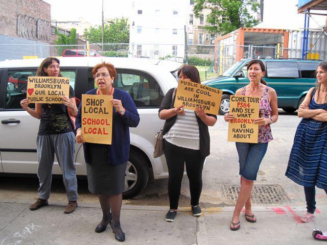 <p>Members of WAGPOPS joined local officials to rally for public schools over charters in the neighborhood.</p>
