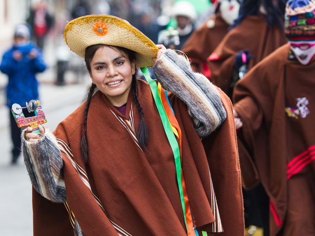 <p>A woman dressed in traditional Puerto Rican costume marches at the 36th Annual Three Kings Day Parade in East Harlem on Jan. 4, 2013.</p>
