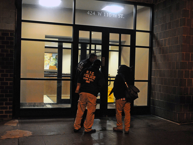 <p>Police at 424 Cathedral Parkway, where a 1-year-old girl died after being burned by a radiator Feb. 19, 2013.</p>
