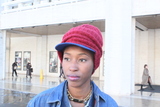<p>Athanaelle Paul a fashion blogger, pairs a Brooklyn Dogers baseball cap with a University of Alabama beanie.</p>
