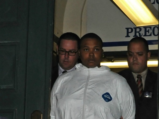 <p>Bahsid McLean, 23, was walked from the 40th Precinct stationhouse Feb. 27, 2013 after he was charged with chopping up his mother's body.</p>
