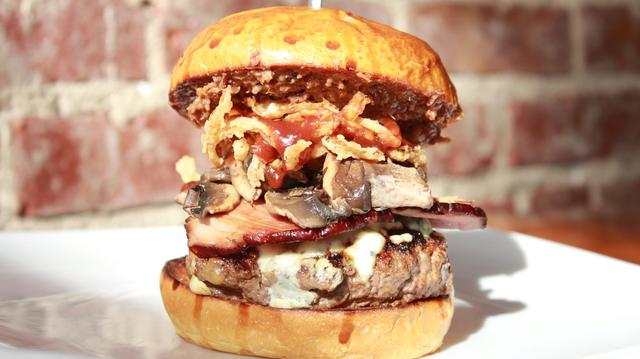 <p>Bareburger's Big Blue burger with Wisconsin blue cheese, bacon, fried onions and much more.</p>

