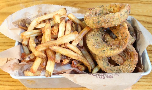 <p>The fries and onion ring combo at Bareburger.</p>
