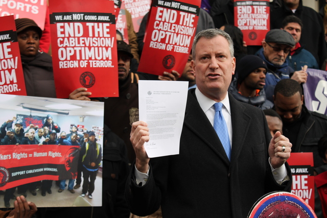 <p>Public Advocate and Democratic mayoral candidate Bill de Blasio called on the City Council to hold Cablevision accountable for alleged labor violations Tuesday, Feb. 26, 2013. He held aloft an open letter he sent Monday to the National Basketball Association, urging the league to hold its 2015 All-Star Game at the Barclay's Center instead of Madison Square Garden, where Cablevision CEO James Dolan serves as executive chairman.</p>
