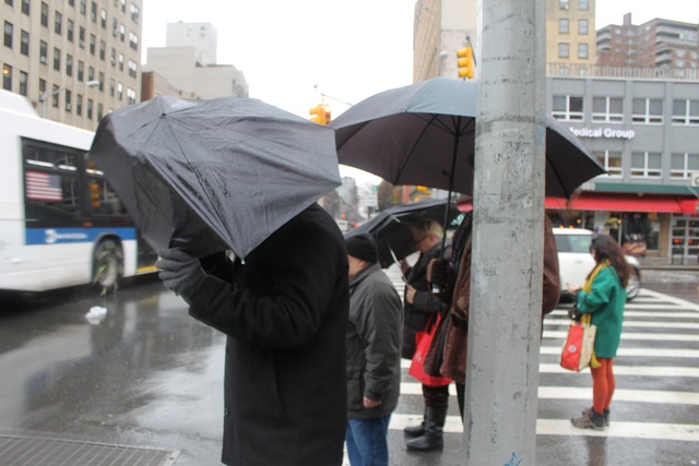 <p>Pedestrians struggled against the wind in Chelsea on Feb. 8, 2013.</p>
