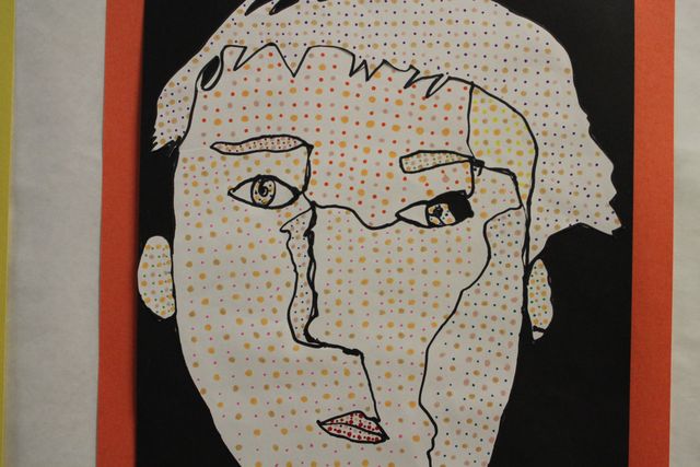<p>Artwork is plastered along the hallways of the Center School.</p>
