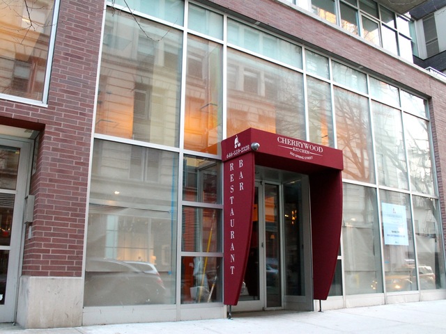 <p>Cherrywood Kitchen, located at 300 Spring St. near Hudson Street, is set to open in March 2013. With former Nobu chef Chris Cheung in the kitchen, the restaurant will specialize in smoked meats and seafood.</p>
