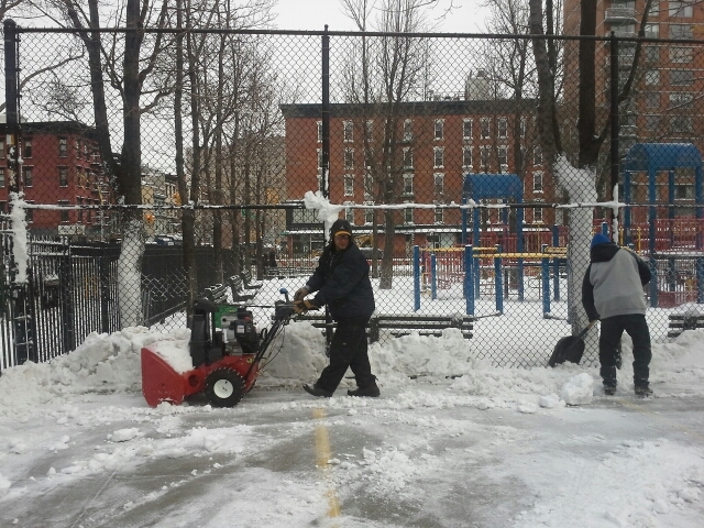 <p>Dil Collin and Israel Bonanno shoveling snow outside of ABC Playground, on the Lower East Side on Feb. 9, 2013.</p>
