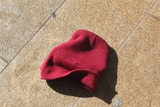 <p>A lost colored beanie on the ground at Lincoln Center at Fashion Week.</p>

