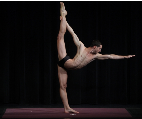 <p>Jared McCann did the standing bow posture at a USA Yoga competition.</p>
