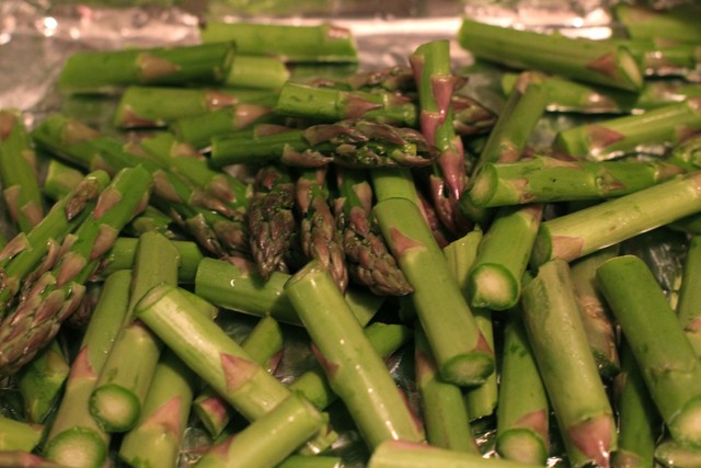 <p>Asparagus are broiled to get a tasty char.</p>
