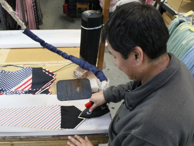 <p>Ties, handmade for David Hart's fashion collection, go through a ten-step process of cutting, stitching and pressing.</p>
